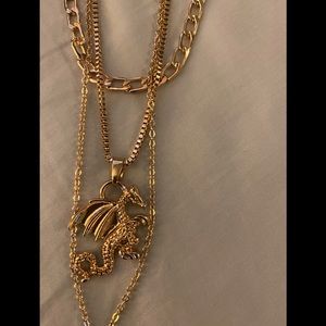 New layered gold colored winged dragon necklace